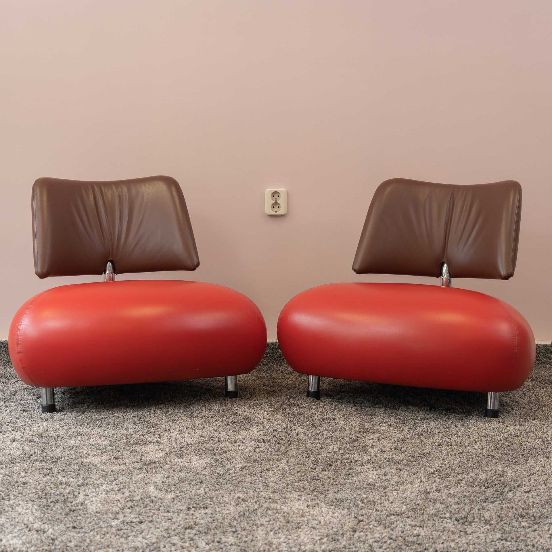 2x Leolux Pallone fauteuils in de kleurstelling rood/bruin